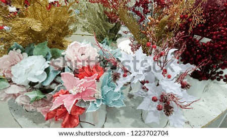 Merry Christmas and Happy New Year! New Year, Christmas background with decorations. Concept Christmas family shopping. New Year's toys in the form of a flower.