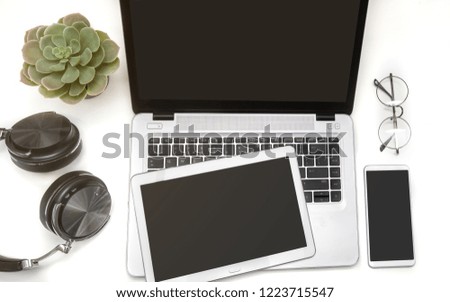 Responsive design mockup. Mock up mobile phone, digital tablet and laptop. office desk
