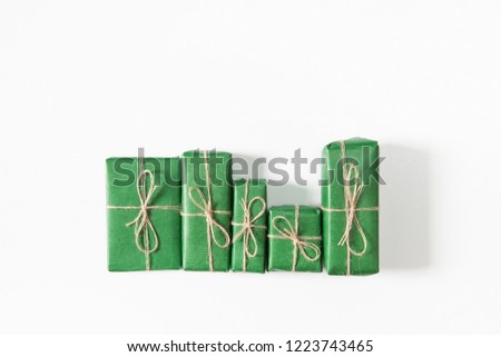 Presents in gift boxes on whit background. Flat lay, top view