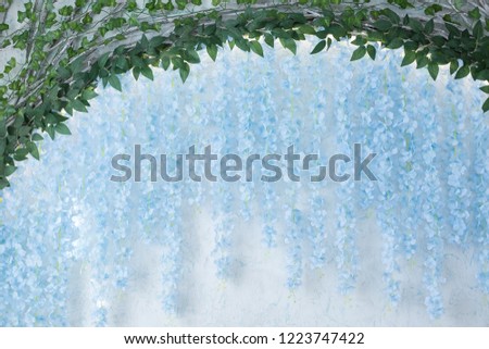arch with blue flowers. hanging flowers room decoration