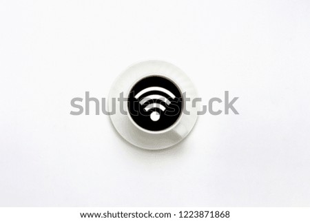 White cup on a saucer, black coffee, white background. WiFi sign. Flat lay, top view