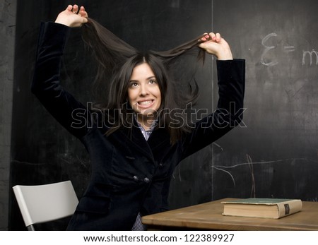 portrait of happy cute student in classroom having fun