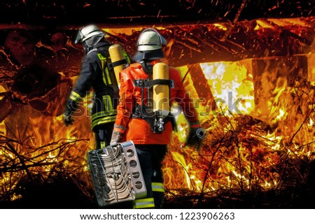 firemen by the fire