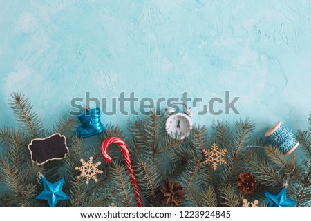 Christmas objects on the blue background top view. Christmas background