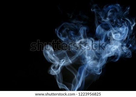 Cigarette smoke on a black background       