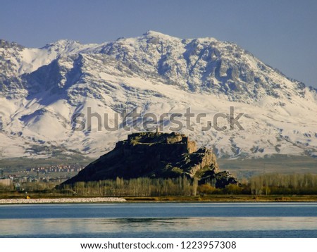 The view of Van castle, snowy monutains background.