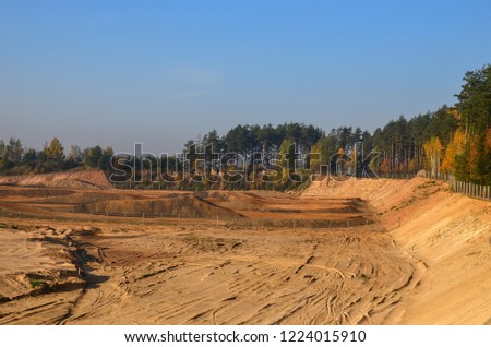 View of the large sand pit. Production useful minerals. Mining