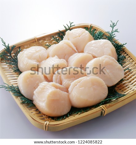  Scallop adductor on bamboo tray Royalty-Free Stock Photo #1224085822