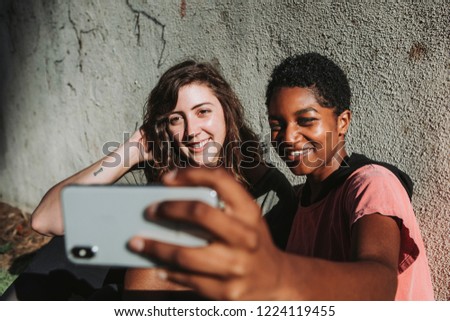 Diverse friends taking a selfie