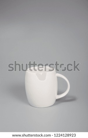 Gray shades with white cup
