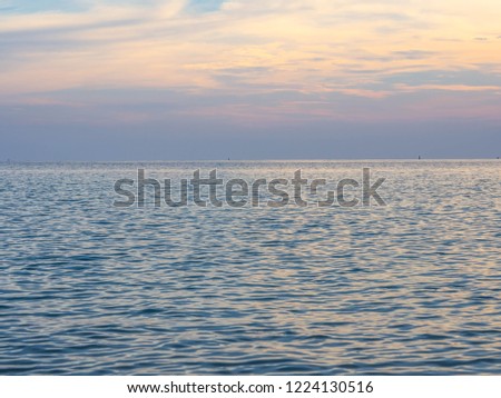 Sunset background with gray cloud sky. 