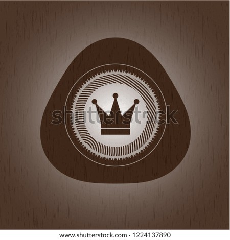 crown icon inside wood emblem. Vintage.