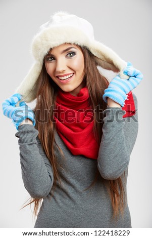 Funny woman wearing a winter cap, isolated studio portrait.