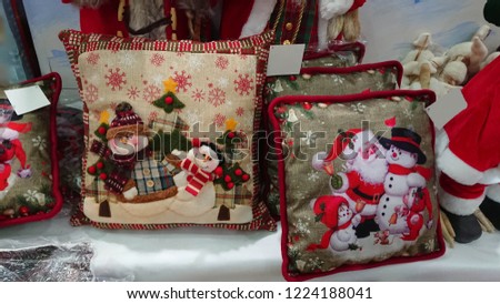 Christmas decor. Statuettes and pillows from Santa and snowmen. Christmas Pillow Case