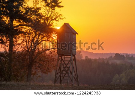 hunting tower in the light of the setting sun