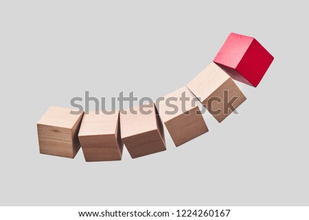 Business & design concept - Abstract geometric real floating wooden dice isolated on background, it's not 3D render. symbol of leadership, teamwork and success

