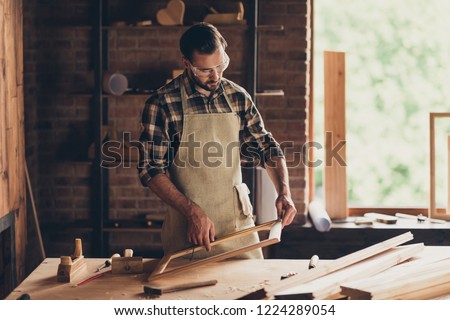 Everyday routine people professional person concept. Photo portrait of serious modern retro vintage confident candid content master handyman using tape line hold in hand at table toptable desktop