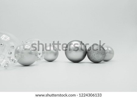 Monochrome elegant Christmas wallpaper background of tree decorations. Classy holidays image in black and white.