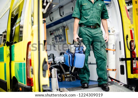 Paramedics at work with an ambulance Royalty-Free Stock Photo #1224309019