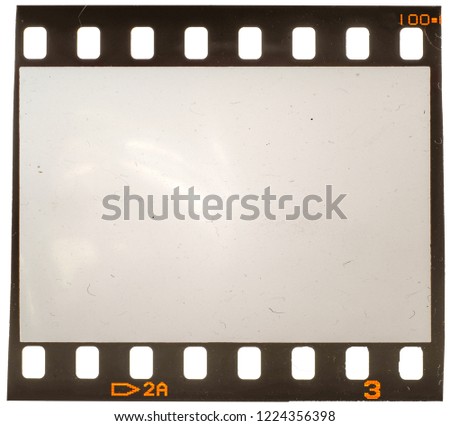 Real macro photo of 35mm dia filmstrip on white, placeholder for your image