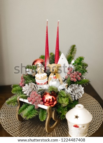 Christmas decoration candlestick with vintage toys teddy bear and candles