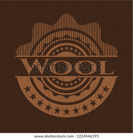 Wool badge with wood background