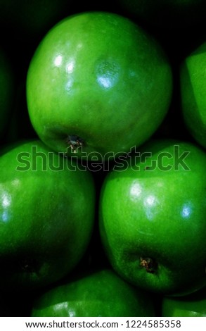 Green apple market and closeup dark background
