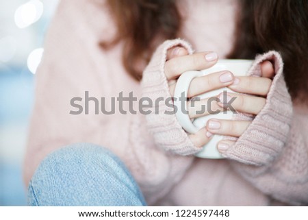 Girl Drinking a Hot Drink, Holding Mug. Cozy Comfort