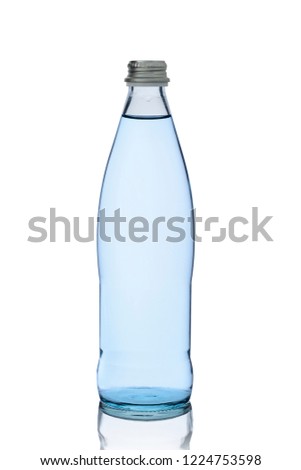 glass bottle with transparent soft drink or water on a white background