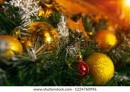 Christmas tree decorated with garlands, close-up.