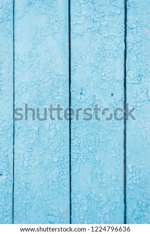 reddish-blue wood texture damaged by time