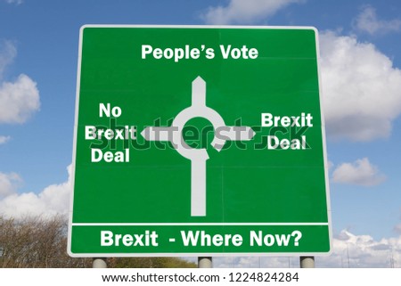 Green roadsign with options for Brexit negotiations including a Bexit deal, no Brexit deal or a People's Vote.  Royalty-Free Stock Photo #1224824284
