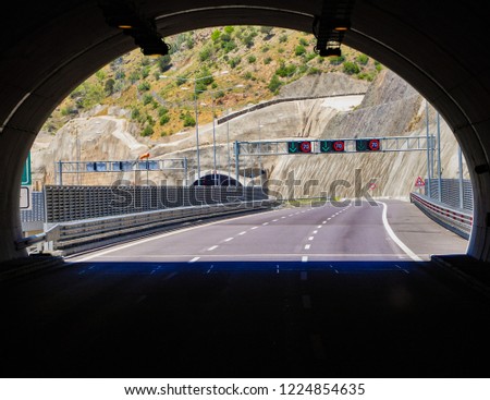 The view of highway from inside road tunnel.