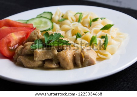 pasta with chicken and vegetables on white plate copy space food photo design idea for designer and site