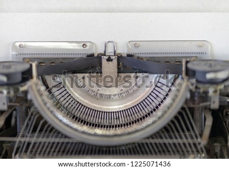 close up image of typewriter with paper sheet. copy space for your text. retro filtered
