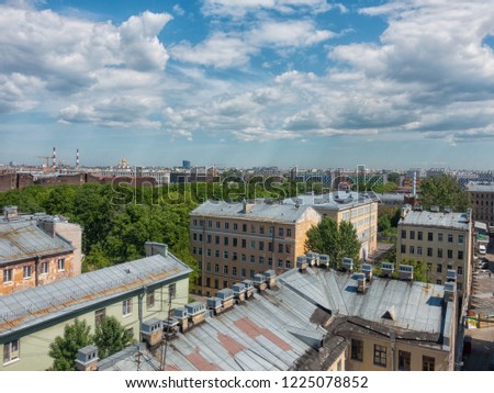 city roofs on a summer day