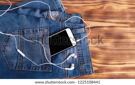 Pants smartphone and headphones
