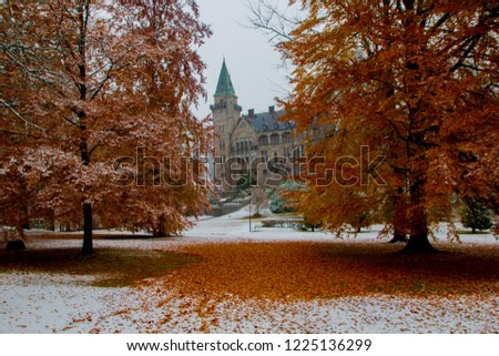 Teleborg Castle in Växjö in Sweden, Smaland during autumn with first snow. Scenic hidden view.