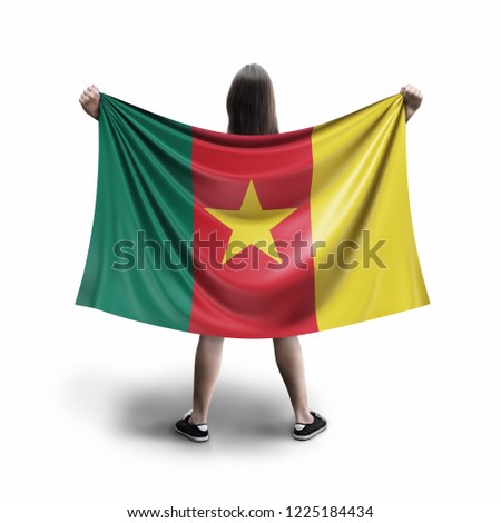 Women and Cameroon flag