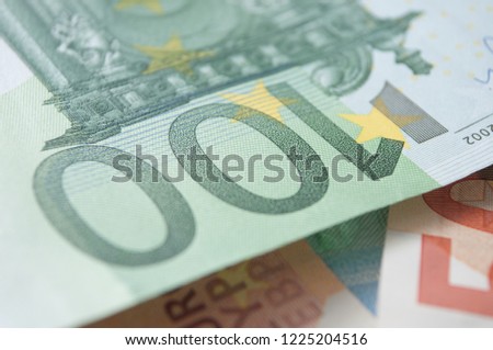 closeup of banknotes of hundred euros money 