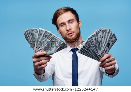 man with paper money in the hands of wealth business                              
