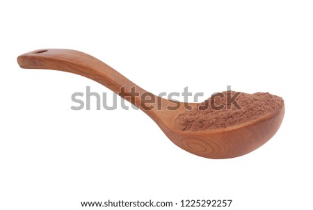 Spoon with cacao powder isolated on white 