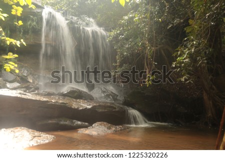 Long exposure of a backyard waterfall