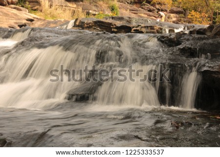 Long exposure of a backyard waterfall