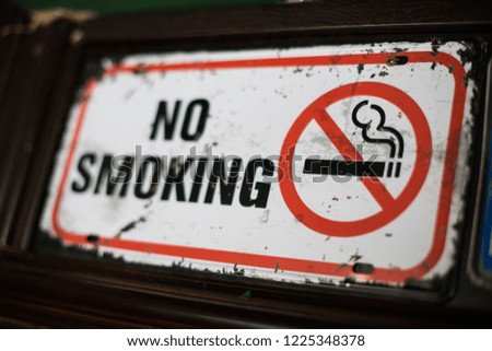 Close up shot of a no smoking sign.
