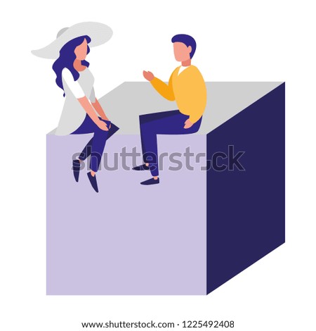 young couple sitting in the cube