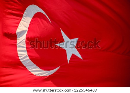 red Turkish flag fluttering in the wind
