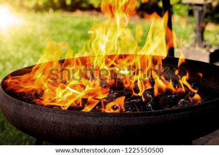 Burning barbecue fire