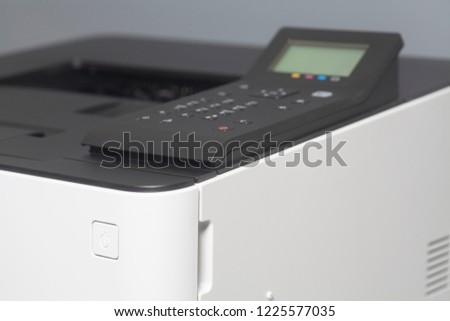 Laser color printer isolated on gray background