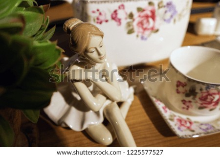 Ceramic decorative sculpture.Ceramic figure of woman             